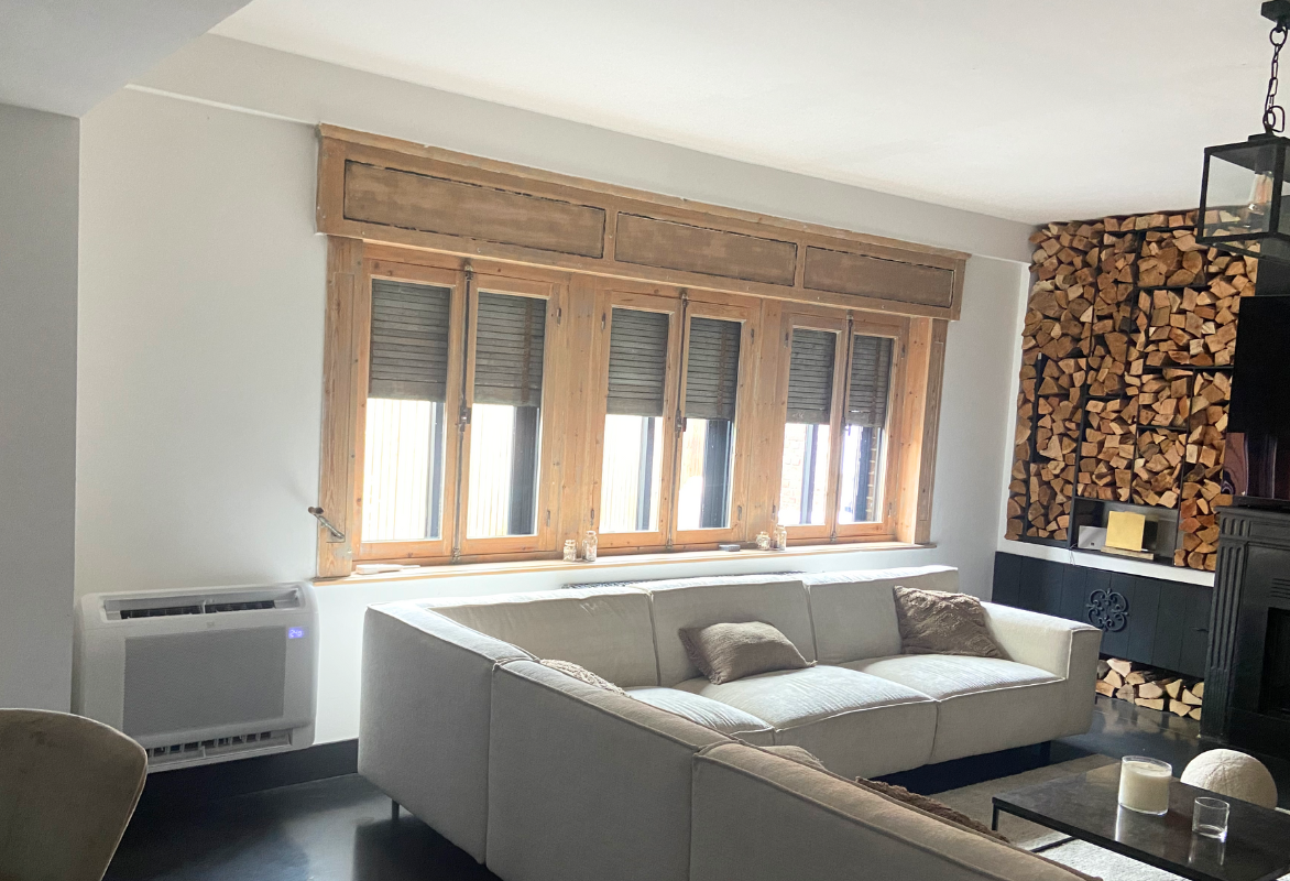 icestream-climatisation-console-ferme intérieur d'une maison restaurée avec une climatisation console