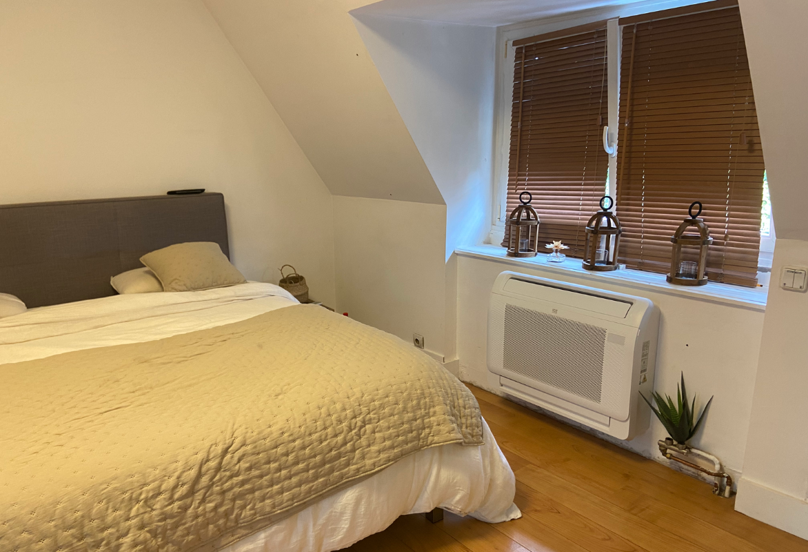 icestream-climatisation-console-ferme intérieur d'une maison restaurée avec une climatisation console